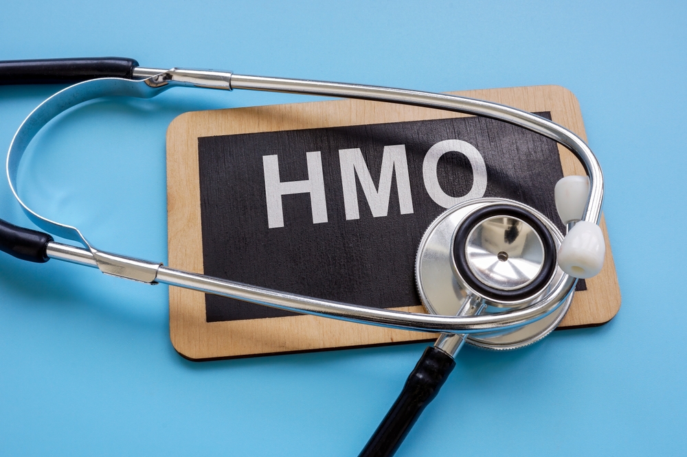 a,plate,with,an,inscription,health,maintenance,organization,hmo,and